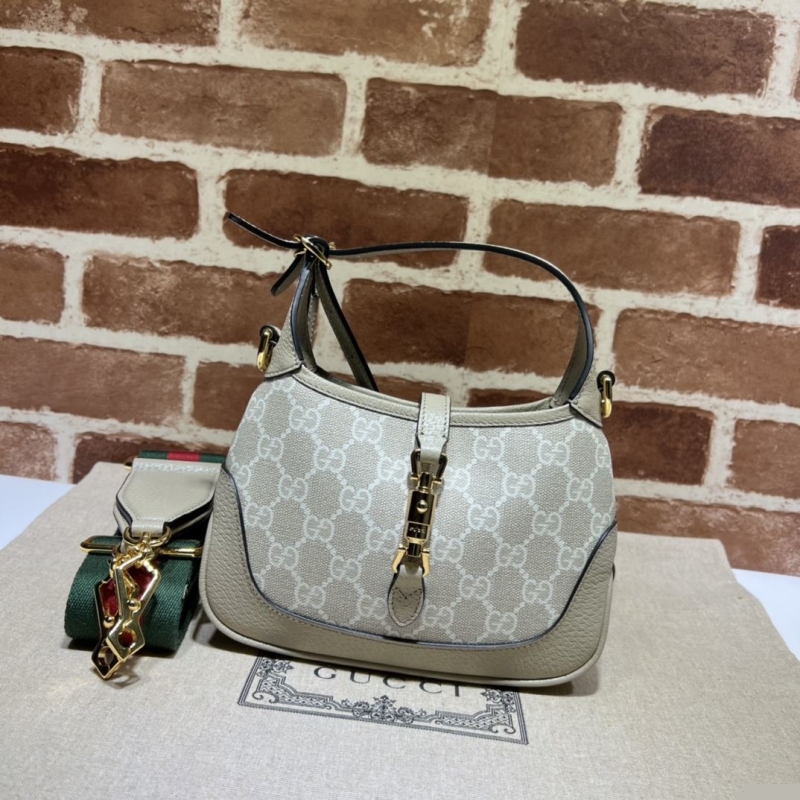 G*u*i top handle bags